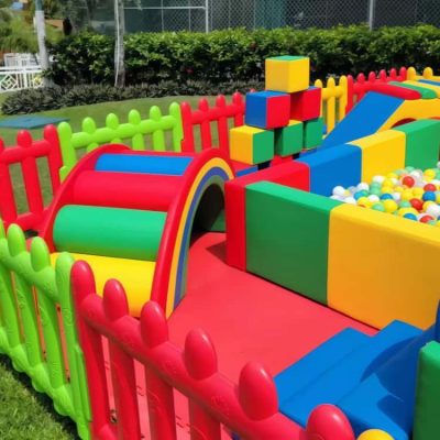 Bright-red-green-yellow-blue-indoor-playground-for-kids-1.jpg Vibrant Indoor Soft Play Set – Bright Red, Green, Yellow, and Blue
